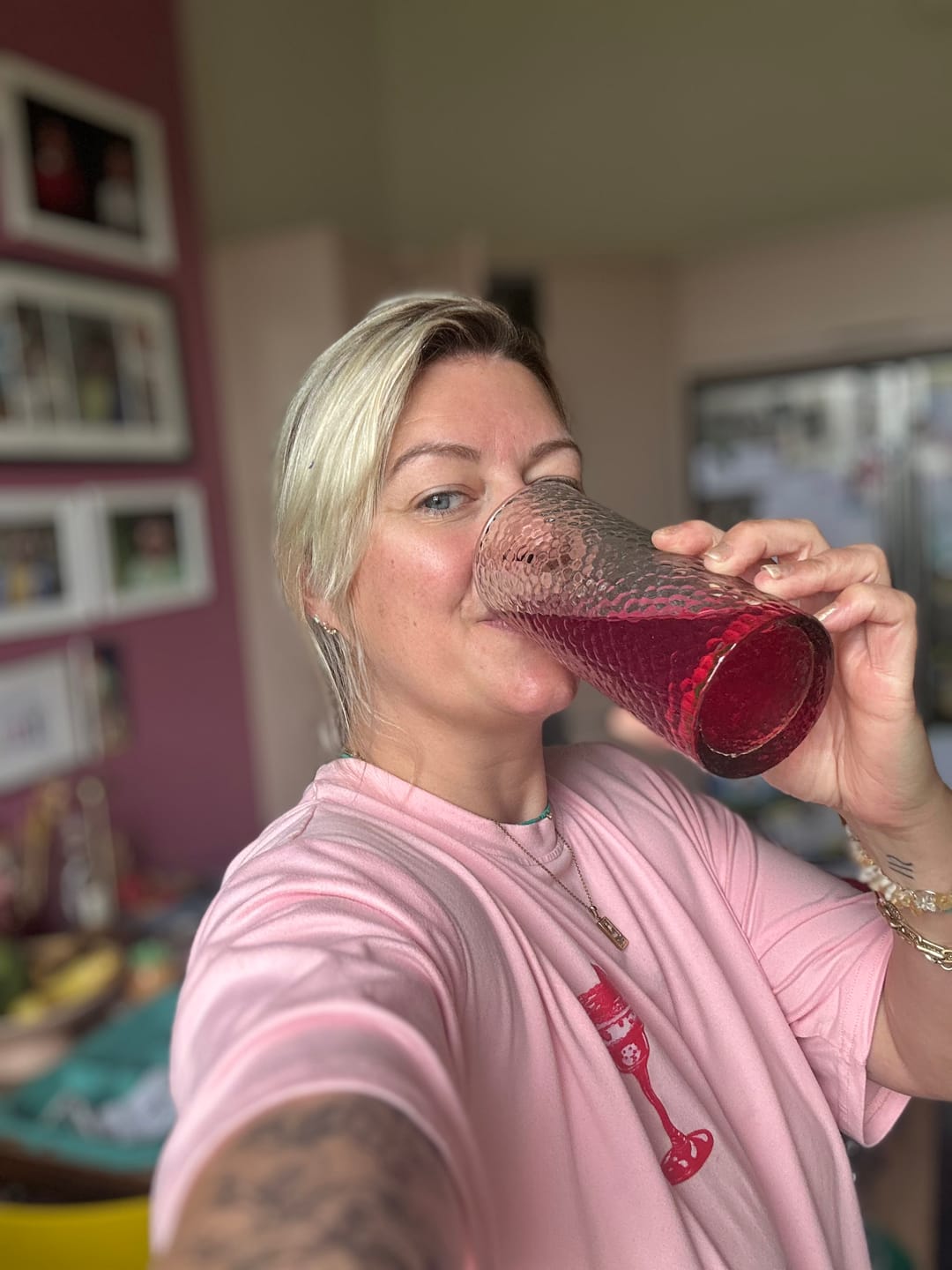 Customer drinking Water Wealth summer fruits electrolyte drink - gut health hydration in action